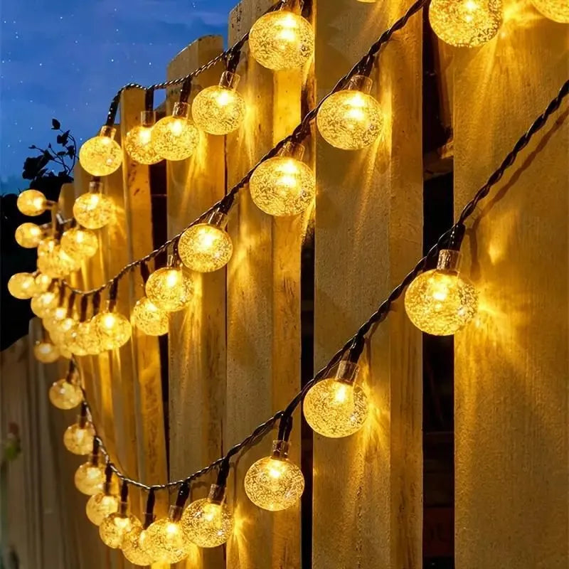Solargirlande mit 100 warmen LED-Lichtern