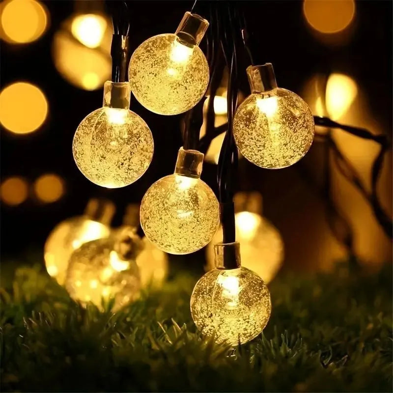 Solargirlande mit 100 warmen LED-Lichtern