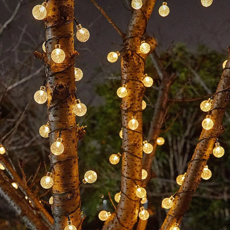 Solargirlande mit 100 warmen LED-Lichtern