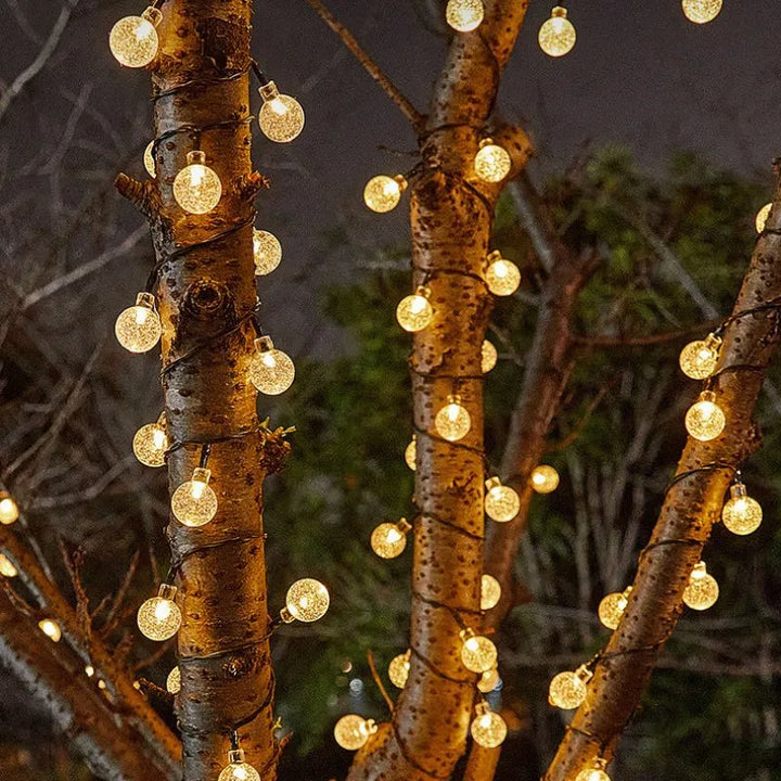 Solargirlande mit 100 warmen LED-Lichtern