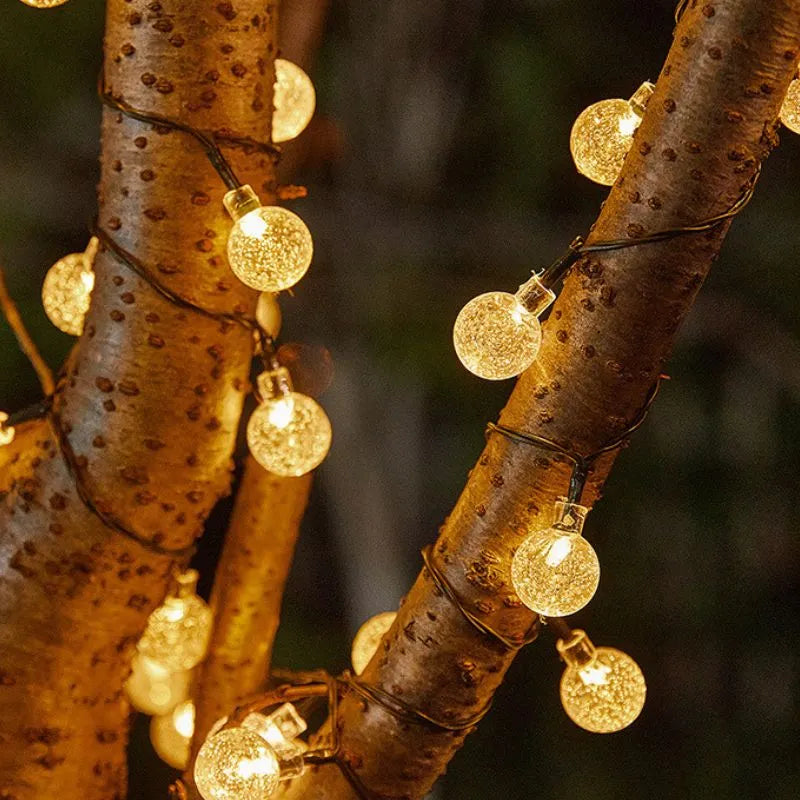 Solargirlande mit 100 warmen LED-Lichtern